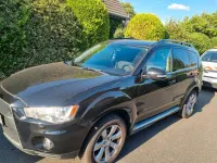 Gebraucht Mitsubishi Outlander 147 PS (108 kW) 2012 Schwarz SUV