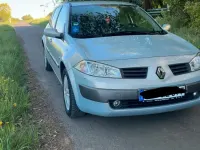 Używany Renault Mégane II 113 KM (83 kW) 2004 Srebrny Sedan/Limuzyna