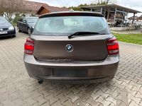Gebraucht BMW 116 100 PS (73 kW) 2013 Braun Kleinwagen