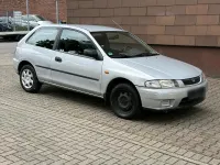 Używany Mazda 323 88 KM (64 kW) 1998 Srebrny Hatchback