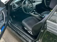 Gebraucht BMW 116 122 PS (89 kW) 2010 Schwarz Kleinwagen