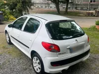 Gebraucht Peugeot 206+ 73 PS (53 kW) 2011 Weiß Kleinwagen