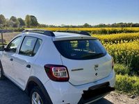 Używany Dacia Sandero Prestige 90 KM (66 kW) 2014 Biały Hatchback