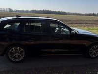 Gebraucht BMW 320e Advantage 163 PS (119 kW) 2021 Schwarz Kombi