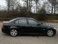 Gebraucht BMW 320 184 PS (135 kW) 2010 Schwarz Limousine