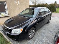 Gebraucht Kia Cerato 105 PS (77 kW) 2005 Schwarz Limousine