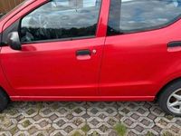 Gebraucht Nissan Pixo 68 PS (50 kW) 2011 Rot Kleinwagen