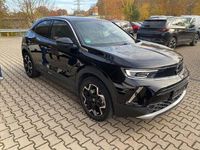 Gebraucht Opel Mokka-e Ultimate 100 kW (136 PS) 2022 Diamant schwarz/karbon schwarz SUV