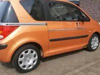 Gebraucht Peugeot 1007 73 PS (53 kW) 2006 Orange Van / Kleinbus