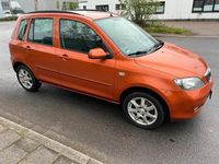 Second-hand Mazda 2 80 CP (58 kW) 2003 Portocaliu Hatchback