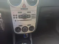 Usado Opel Corsa Edition 80 HP (58 kW) 2007 Cinzento Citadino