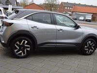 Gebraucht Opel Mokka-e Elegance 100 kW (136 PS) 2022 Kontrast grauquarz silber (metallic) SUV