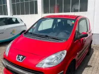 Gebraucht Peugeot 1007 54 PS (39 kW) 2007 Rot Van / Kleinbus