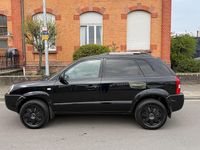 Gebraucht Hyundai Tucson 141 PS (103 kW) 2010 Schwarz SUV