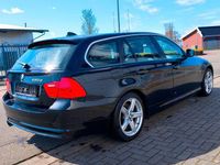 Second-hand BMW 330 245 CP (180 kW) 2011 Negru Break