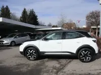 Gebraucht Opel Mokka-e Elegance 100 kW (136 PS) 2023 Arktis weiß SUV