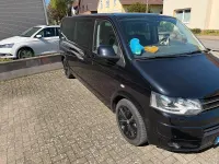 Używany VW Caravelle 180 KM (132 kW) 2013 Czarny Van