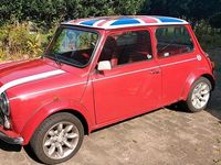 Second-hand Rover Mini 63 CP (46 kW) 1998 Roșu Hatchback