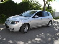 Second-hand Mazda 3 Inclusive 105 CP (77 kW) 2009 Argintiu Berlinǎ