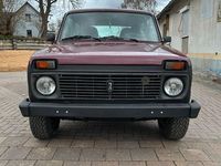 Second-hand Lada niva 82 CP (60 kW) 2004 Roșu SUV