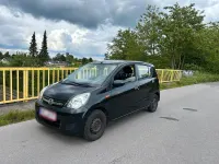 Gebraucht Daihatsu Cuore 70 PS (51 kW) 2007 Schwarz Kleinwagen