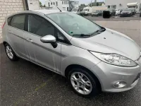 Używany Ford Fiesta Titanium 82 KM (60 kW) 2012 Srebrny Sedan/Limuzyna