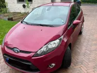Second-hand Ford Fiesta Titanium 82 CP (60 kW) 2009 Roșu Berlinǎ