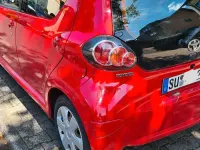 Gebraucht Toyota Aygo 60 PS (44 kW) 2011 Rot Kleinwagen