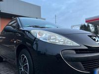 Gebraucht Peugeot 206+ 68 PS (50 kW) 2011 Schwarz Kleinwagen