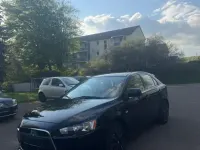 Second-hand Mitsubishi Lancer 143 CP (105 kW) 2009 Negru Berlinǎ
