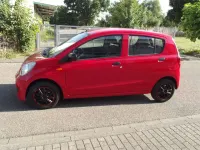 Gebraucht Daihatsu Cuore 69 PS (50 kW) 2008 Rot Kleinwagen