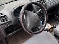 Second-hand Suzuki Ignis 82 CP (60 kW) 2002 Negru Hatchback