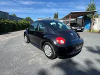 Gebraucht VW New Beetle 75 PS (55 kW) 2006 Schwarz Kleinwagen