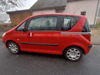 Gebraucht Peugeot 1007 Premium 73 PS (53 kW) 2006 Rot Van / Kleinbus