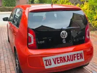 Używany VW up! 75 KM (55 kW) 2014 Pomarańczowy Hatchback