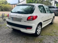 Gebraucht Peugeot 206+ 73 PS (53 kW) 2011 Weiß Kleinwagen