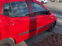 Gebraucht Hyundai i10 45 PS (33 kW) 2009 Rot Kleinwagen