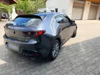 Używany Mazda 3 186 KM (136 kW) 2023 Szary Sedan/Limuzyna
