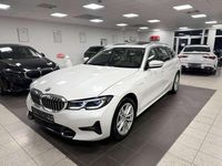 Gebraucht BMW 330e Luxury Line 184 PS (135 kW) 2022 Mineralweiss metallic Kombi