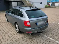 Używany Skoda Superb 140 KM (102 kW) 2012 Niebieski Kombi