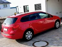 Używany Opel Astra Edition 110 KM (80 kW) 2012 Czerwony Kombi