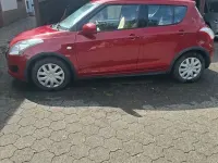 Gebraucht Suzuki Swift 94 PS (69 kW) 2012 Rot Kleinwagen