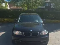 Gebraucht BMW 116 122 PS (89 kW) 2009 Schwarz Kleinwagen