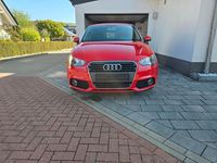 Używany Audi A1 Attraction 105 KM (77 kW) 2011 Czerwony Hatchback