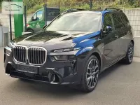 Gebraucht BMW X7 Sport Line 381 PS (280 kW) 2023 Tansanitblau meta (metallic) SUV