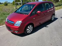 Second-hand Opel Meriva 105 CP (77 kW) 2006 Roșu Monovolum