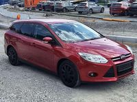 Gebraucht Ford Focus Trend 101 PS (74 kW) 2014 Candyrot metallic Kombi