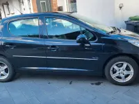 Gebraucht Peugeot 207 95 PS (69 kW) 2011 Schwarz Kleinwagen