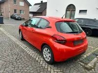 Gebraucht Peugeot 208 86 PS (63 kW) 2016 Orange Kleinwagen