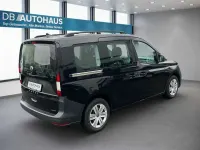 Second-hand VW Caddy 122 CP (89 kW) 2022 Negru Monovolum